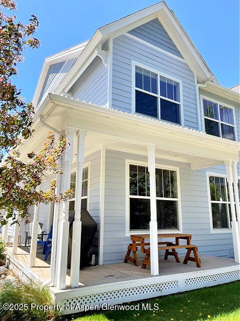 view of home's exterior with a porch