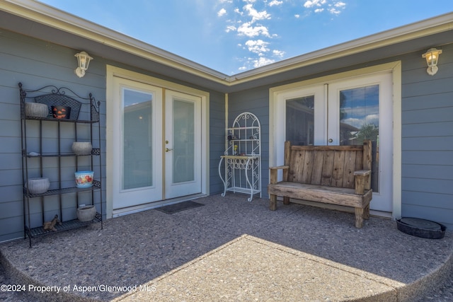 entrance to property featuring french doors