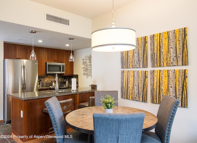 dining area with sink