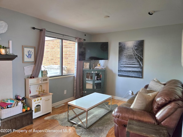 681 S 2nd St Unit G, Carbondale, CO 81623 - living room with light wood-type flooring and baseboards