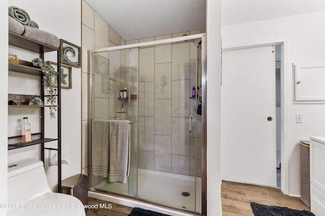68 E Bonanza Pl, Parachute, CO 81635 - full bath with wood finished floors, a stall shower, and vanity