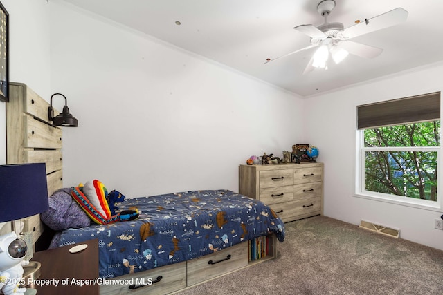 68 E Bonanza Pl, Parachute, CO 81635 - bedroom featuring carpet flooring, ornamental molding, and a ceiling fan