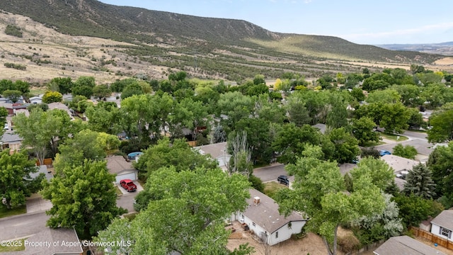 68 E Bonanza Pl, Parachute, CO 81635 - aerial view of residential area with a mountain backdrop