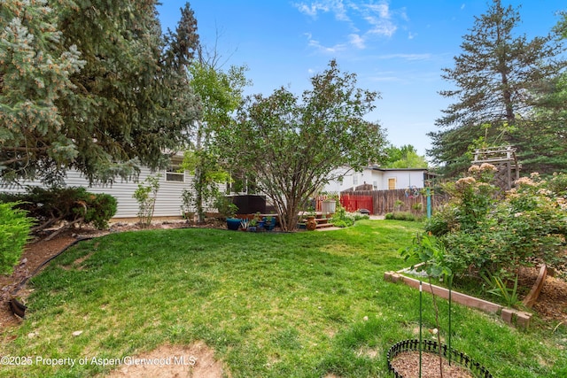 68 E Bonanza Pl, Parachute, CO 81635 - view of yard with a vegetable garden