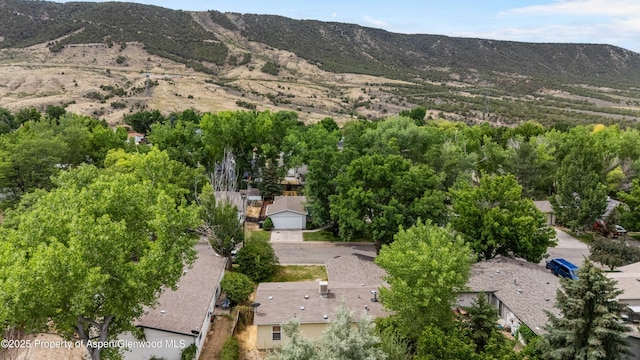 68 E Bonanza Pl, Parachute, CO 81635 - aerial overview of property's location featuring a mountain backdrop