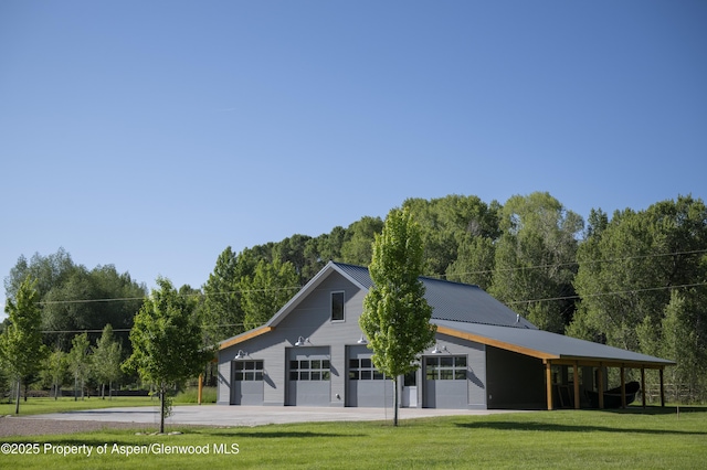 1207 Hooks Spur Rd, Basalt, CO 81621 - view of community with a detached garage and a lawn