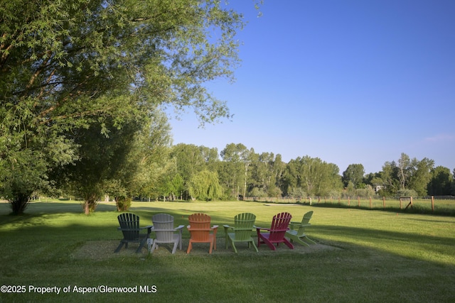1207 Hooks Spur Rd, Basalt, CO 81621 - view of green lawn featuring view of wooded area