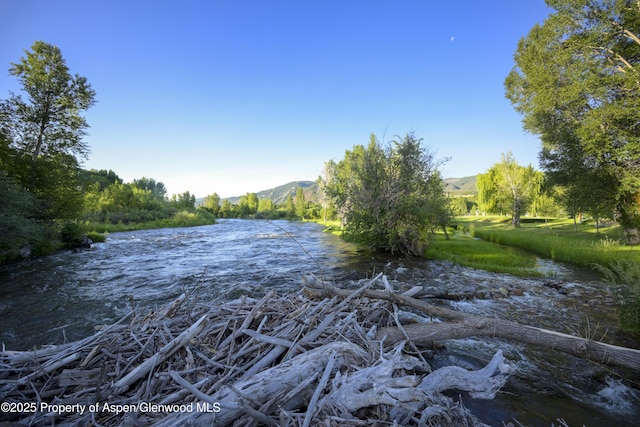1207 Hooks Spur Rd, Basalt, CO 81621 - water view featuring a mountain backdrop