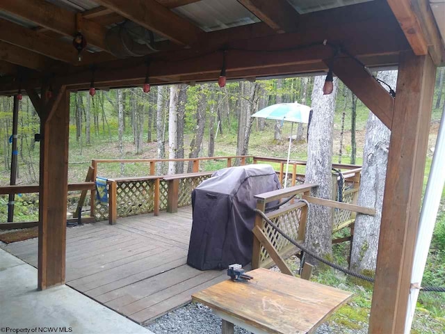 wooden deck featuring grilling area