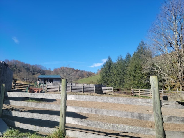 view of gate featuring a rural view