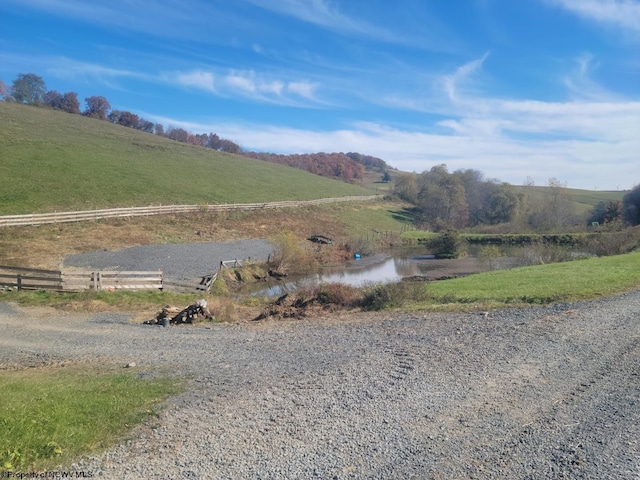 view of mountain feature with a rural view