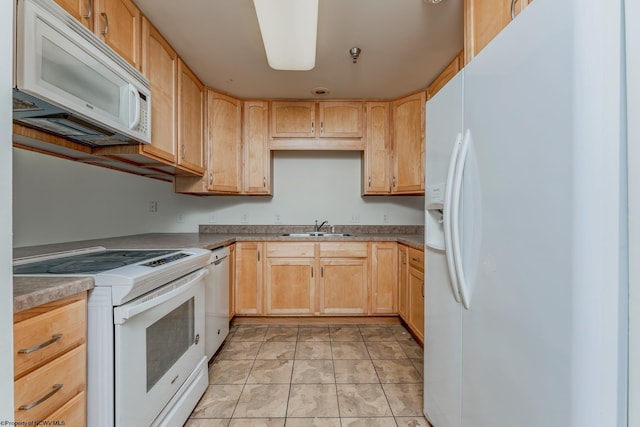 kitchen with white appliances, sink, light brown cabinetry, and light tile floors