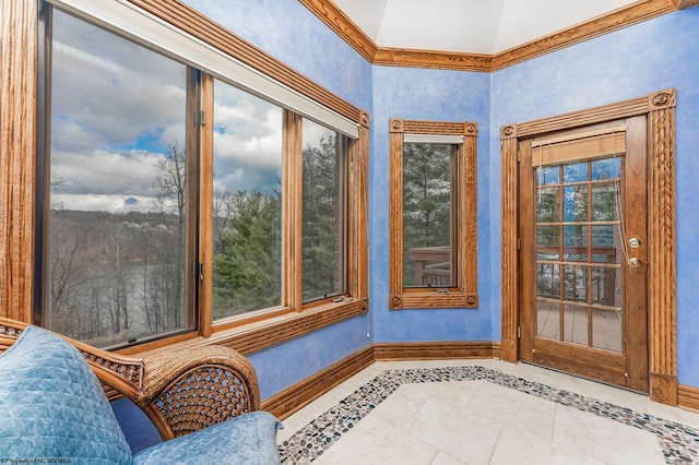 sunroom / solarium with lofted ceiling