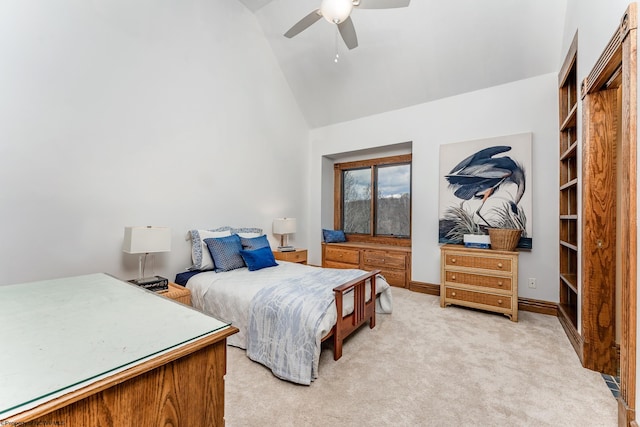 carpeted bedroom featuring high vaulted ceiling and ceiling fan