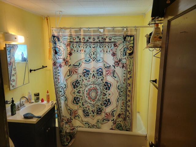 bathroom with shower / bathtub combination with curtain and vanity