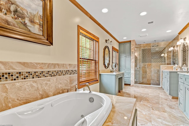 bathroom with separate shower and tub, tile floors, ornamental molding, and vanity