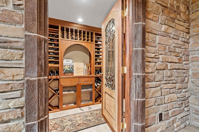 wine room with light tile flooring