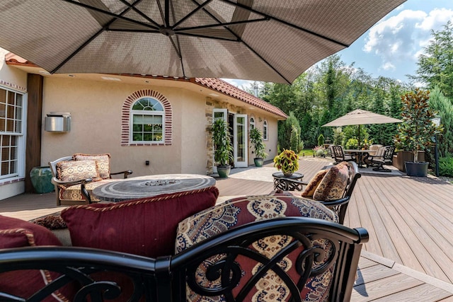 wooden deck featuring an outdoor living space