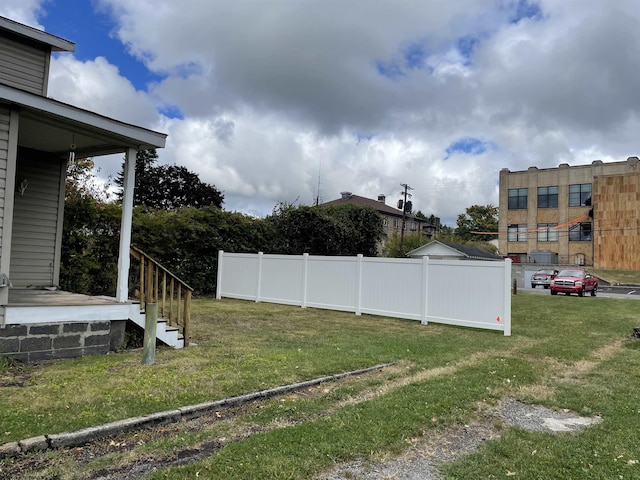 view of yard featuring fence