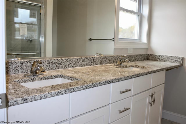 bathroom with double vanity