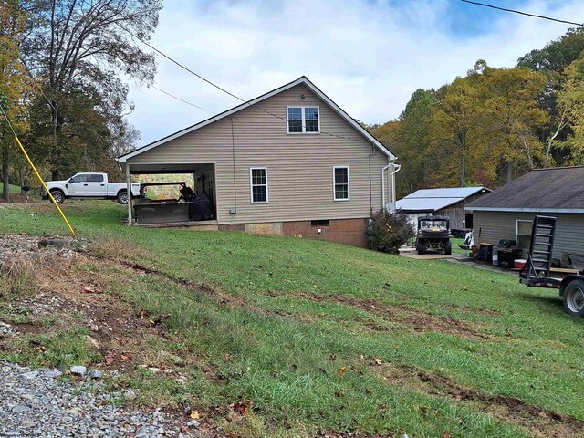 583 Gallop Run Rd, Lost Creek, WV 26385 - rear view of house featuring a lawn