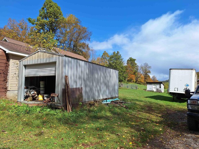 583 Gallop Run Rd, Lost Creek, WV 26385 - view of shed / structure with a lawn