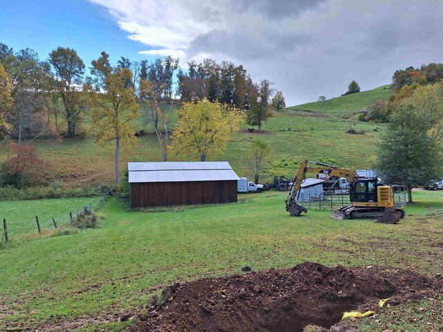 583 Gallop Run Rd, Lost Creek, WV 26385 - view of yard featuring an outdoor structure and a rural view