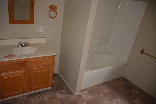 bathroom featuring oversized vanity,  shower combination, and tile floors