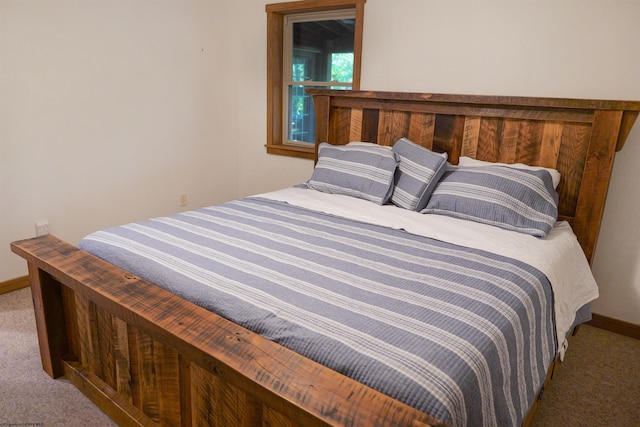 bedroom featuring carpet