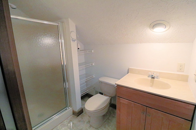 bathroom featuring vaulted ceiling, vanity, a textured ceiling, a shower with shower door, and toilet