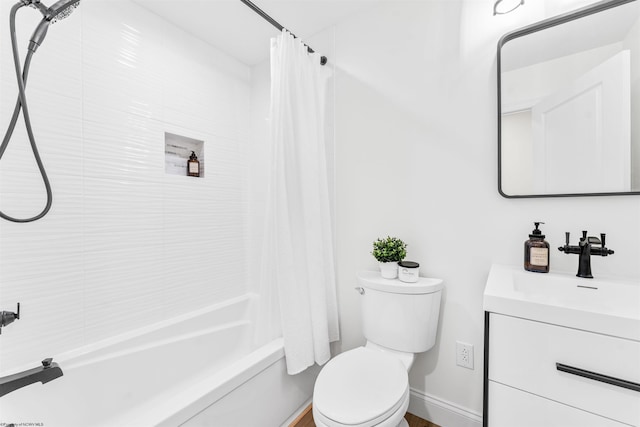 full bathroom with vanity, shower / bath combination with curtain, and toilet