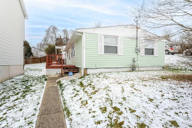 exterior space featuring a wooden deck