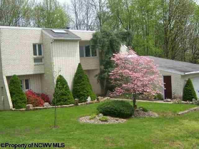 exterior space featuring a front lawn