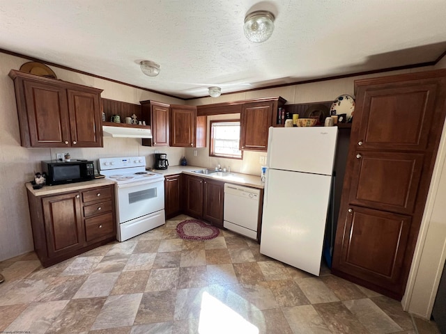 kitchen with white appliances, ornamental molding, light tile floors, and sink