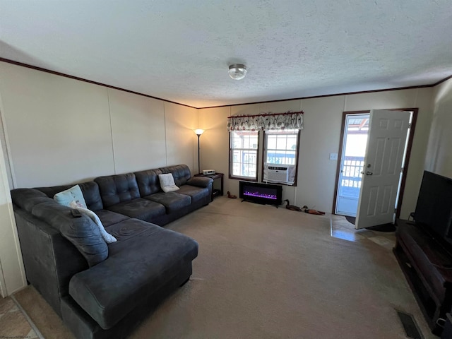 living room with light carpet, a textured ceiling, and ornamental molding