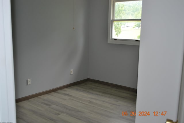 empty room featuring light hardwood / wood-style floors