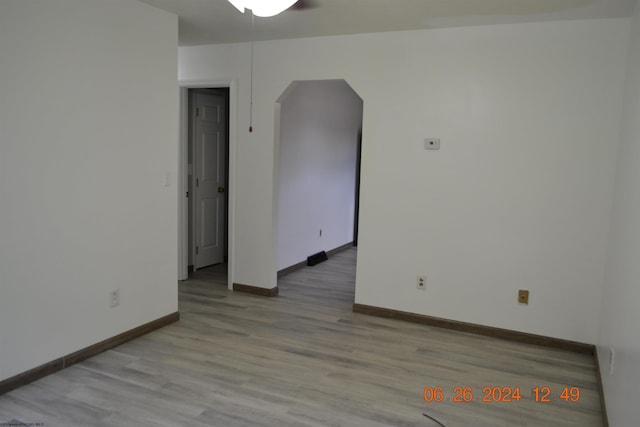 unfurnished room featuring light hardwood / wood-style floors