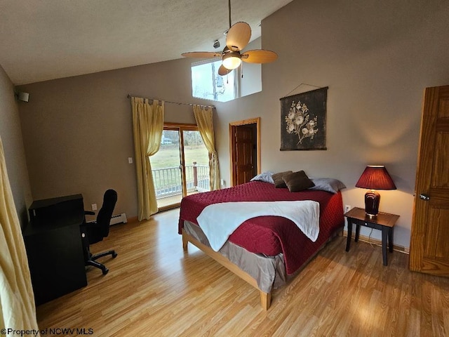 bedroom featuring high vaulted ceiling, light wood-type flooring, access to exterior, and ceiling fan