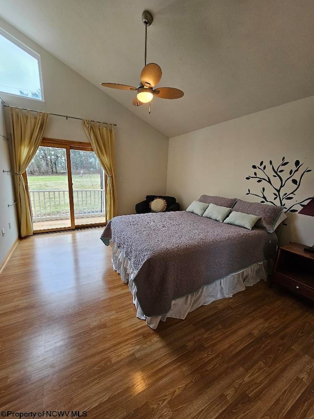 bedroom with access to outside, lofted ceiling, wood-type flooring, and ceiling fan