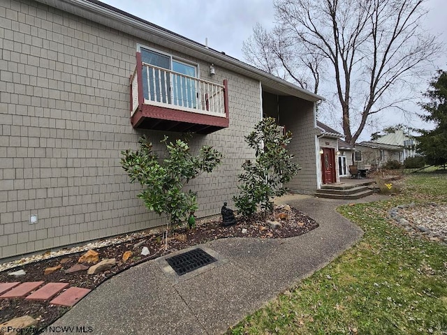 view of home's exterior featuring a balcony