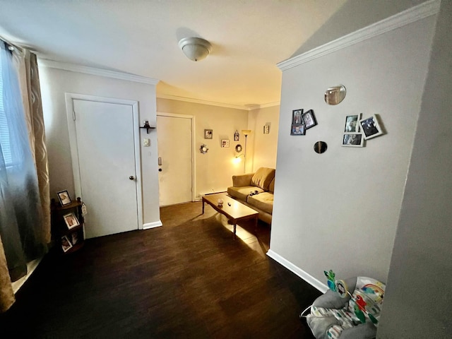 hall with dark hardwood / wood-style flooring and ornamental molding