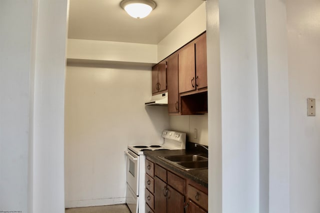 kitchen with white range with electric stovetop and sink