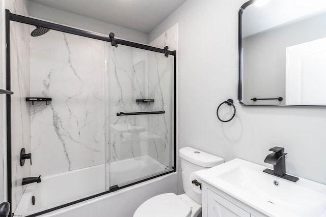 full bathroom featuring vanity, toilet, and enclosed tub / shower combo