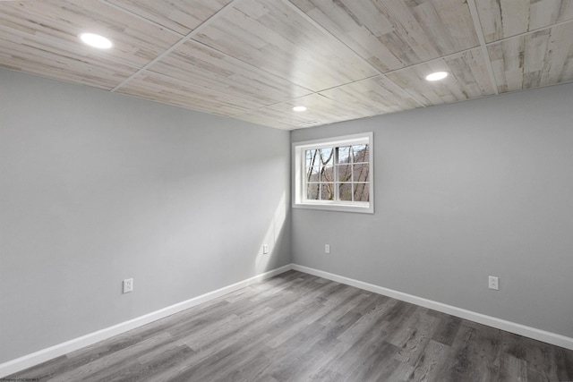 empty room featuring wood-type flooring