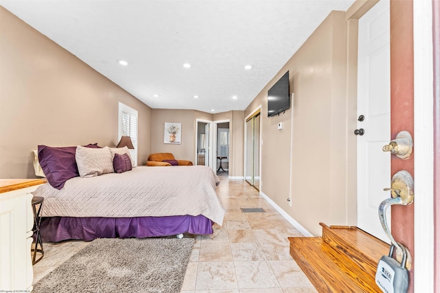 bedroom featuring light tile flooring