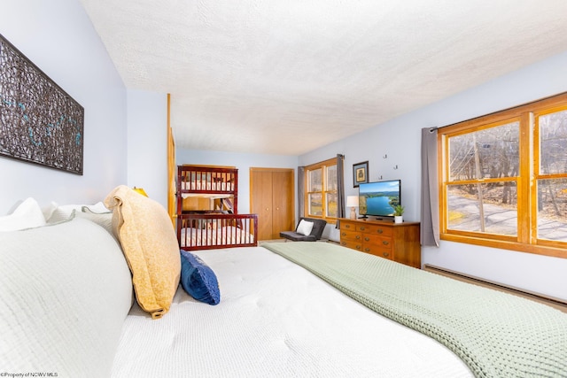 bedroom featuring a textured ceiling