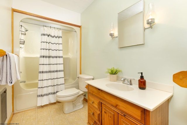 full bathroom featuring toilet, shower / tub combo, tile floors, and vanity with extensive cabinet space