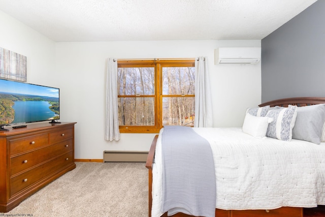 carpeted bedroom featuring a baseboard radiator and an AC wall unit