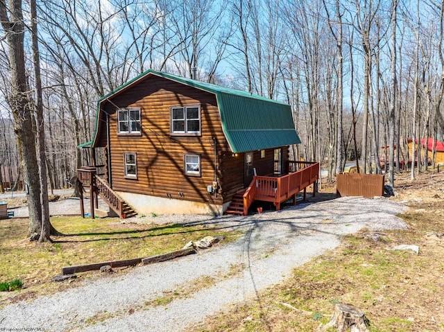 view of home's exterior featuring a deck