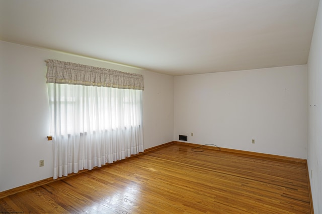 empty room featuring light hardwood / wood-style flooring